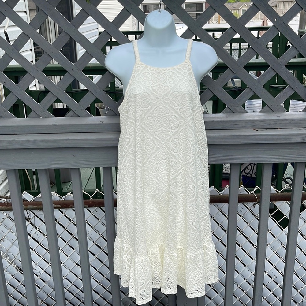 Brand new ivory dress. Perfect bridal shower, honeymoon, out to dinner/casual.